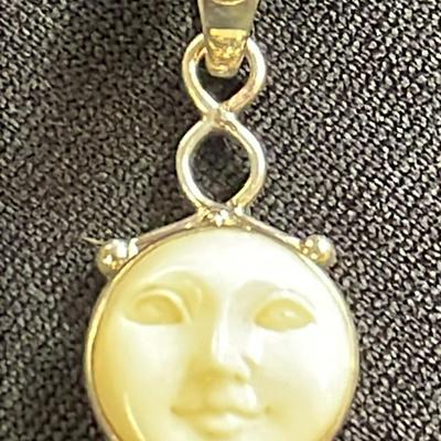 .925 Sterling Silver Carved Bone & Amethyst Pendant