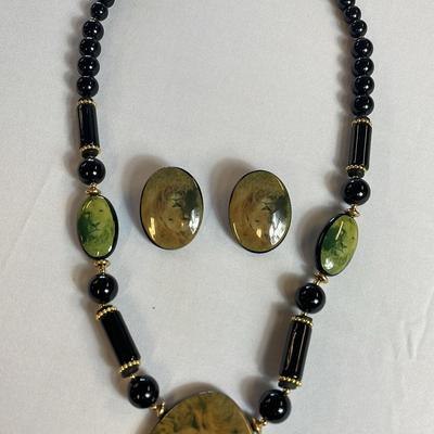 Large 26” Black & Gold Tone Lion Necklace (1) & Matching Clip On Earrings (1)