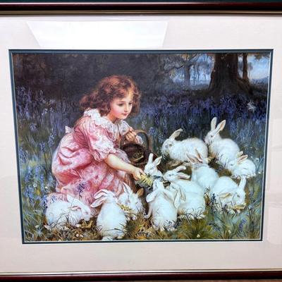 “Feeding the Rabbits” by Frederick Morgan 