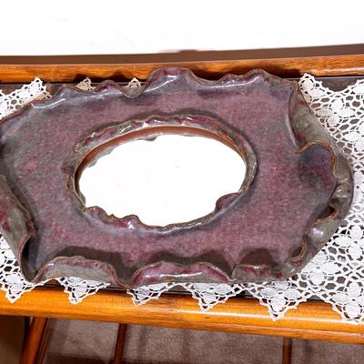 Mirror Wrapped In Sculpted Clay 