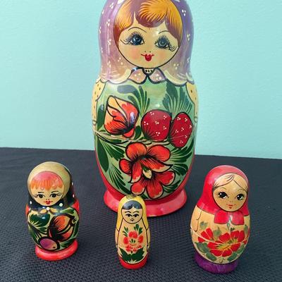 Lot of 4 Hand Painted Wooden Russian Nesting Dolls
