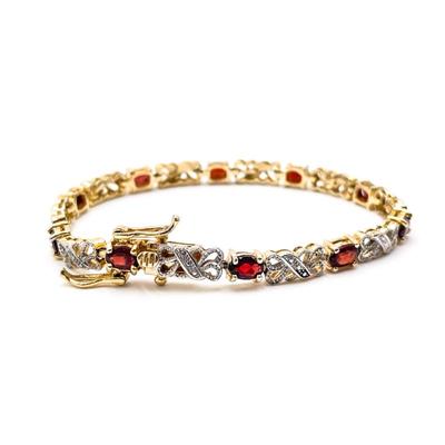 Sale Photo Thumbnail #169: Vintage Garnet Tennis Bracelet in Sterling Silver