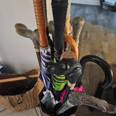 Sale Photo Thumbnail #74: Canes and umbrellas. 
