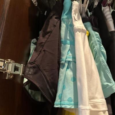 Closet  full of Lululemon tops and skorts