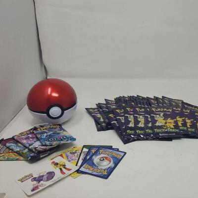 Pokémon Poke Ball and Unopened Pack of Cards