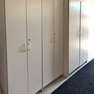 Four White Storage Cabinets