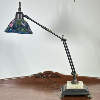 Tiffany Style Desk Lamp | Tiffany-style desk lamp, featuring a stained glass lamp shade with a floral pattern, and an adjustable arm for...