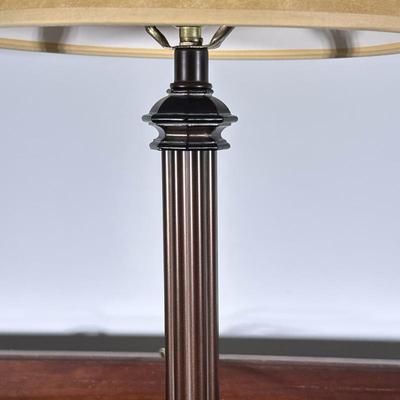Bronze Column Table Lamp | Vintage-inspired metal/brass column table lamp with beige lampshade. - h. 23 x w. 10 in
