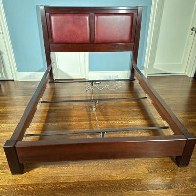 Leather Headboard/Bed - Queen-Sized by John Widdicomb | Queen-sized bed featuring a deep red/burgundy leather-upholstered two-paneled...