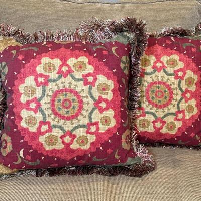 (2pc) Throw Pillows - Red Geometric Pattern 1/2 | Two square throw pillows with geometric pattern and fringed trim. Set 1/2 - h. 18 x w....