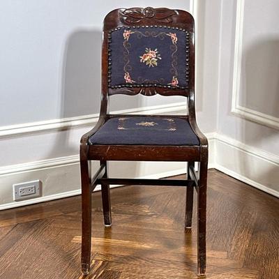 Victorian Style Needlepoint Accent Chair | Antique Victorian style carved wooden accent chair featuring blue upholstered seat and back...