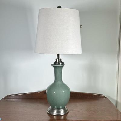 Jade Green Ceramic Table Lamp | Modern jade green ceramic teardrop-shaped table lamp on a chrome base, with a white lampshade. - h. 29 x...