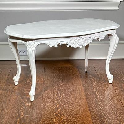 Baroque Style Coffee Table | Baroque style low rectangular white-painted coffee table, with ornate carvings on the front skirt and legs....