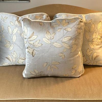(3pc) Throw Pillows - Gold Leaves | Three custom-made light blue silk throw pillows featuring a shiny gold leaf-and-branch pattern and...