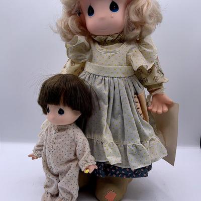 BE132 Precious Moments Dolls