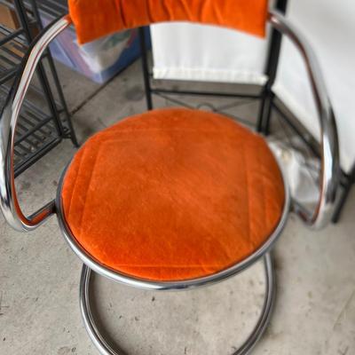 2 Modern Chairs & Blue Trash Can