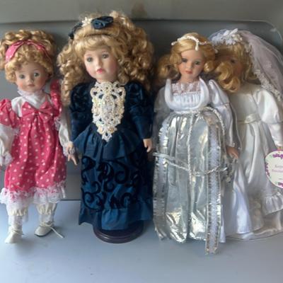 BE728 4 Porcelain Dolls