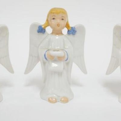 1011	BOEHM PORCELAIN GROUP OF 3 SINGING PIGTAIL ANGELS, EACH APPROXIMATELY 4 1/2 IN HIGH
