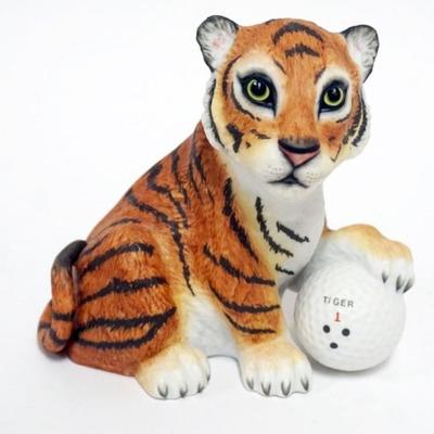 Sale Photo Thumbnail #59: 1059	BOEHM TIGER FIGURE WITH PAW ON GOLF BALL, APPROXIMATELY 5 IN H
