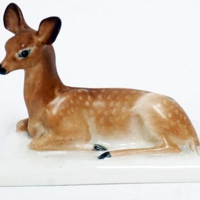 Sale Photo Thumbnail #55: 1055	BOEHM PORCELAIN FAWN FIGURE PAPERWEIGHT, APPROXIMATELY 2 1/2 IN X 4 IN X 3 IN H
