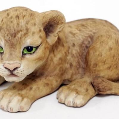 Sale Photo Thumbnail #57: 1057	BOEHM PORCELAIN LION CUB FIGURE, APPROXIMATELY 7 IN X 4 IN X 3 3/4 IN H
