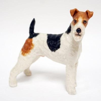 Sale Photo Thumbnail #42: 1042	BOEHM PORCELAIN WIRE HAIR TERRIER DOG FIGURE, APPROXIMATELY 7 IN X 3 IN X 7 IN H
