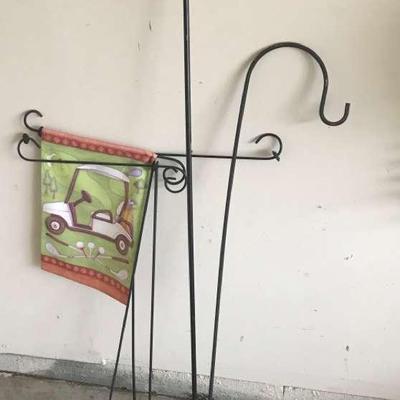 Shepherd Hooks Garden Flags Holders And A Decorative Frog