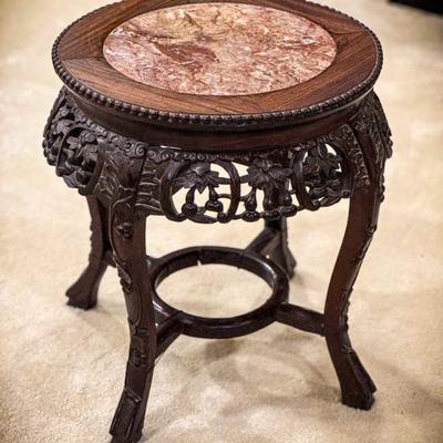Handcarved antique wooden side table with solid marble  top.