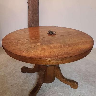 Round Oak Dining Table with Three Leaves & Casters