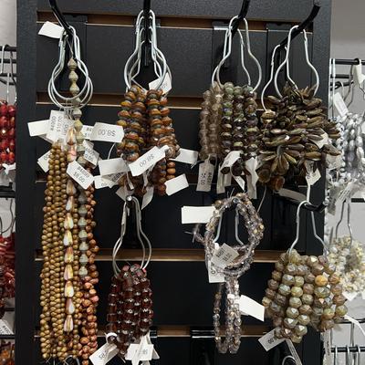 assortment of brown/earth tones beaded bracelets