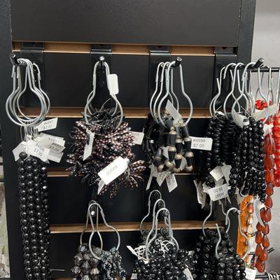 assortment of dark beaded bracelets