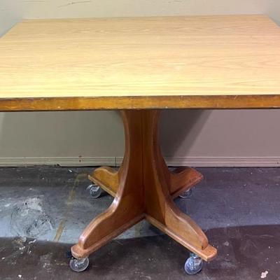 Square Topped Wooden Table
