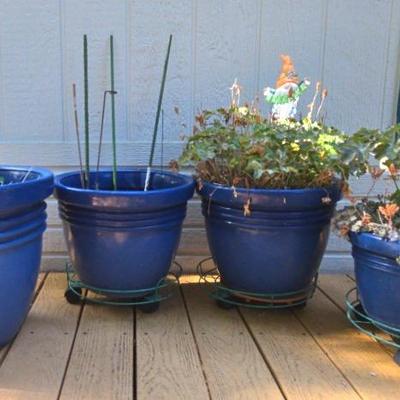 Blue Flower Pots And Roller Stands