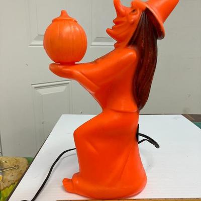 Sale Photo Thumbnail #3: Vintage 1970s blow mold orange witch holding a small pumpkin aaa2903