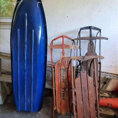 (3) Vintage Wooden Sleds, (1) Plastic Sled