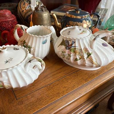 a beautiful 1930s Haviland tea set painted with birds and flowers