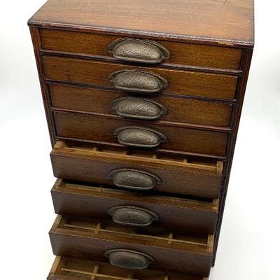 Sale Photo Thumbnail #22: Small antique table top cabinet w/ graduated drawers