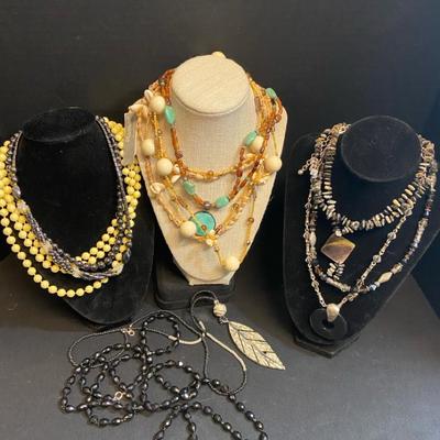 Assortment Of Necklaces Both Beaded & Shells In Blacks & Browns