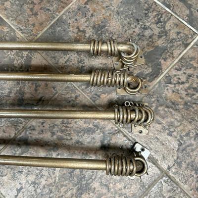 (4pc) Brushed Metal Curtain Rods | Set of four brushed metal curtain rods with finial or detailed ends.
