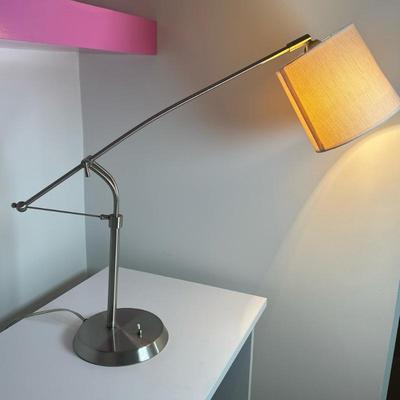 Modern Style Desk/Reading Lamp | Modern style desk/reading lamp with an adjustable arm and a shiny brushed steel finish. - h. 36 x w....