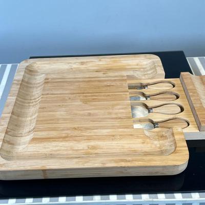 Bamboo Cheese Board With Cheese Knives | Bamboo cheese board with a hidden sliding drawer containing a set of cheese knives.
