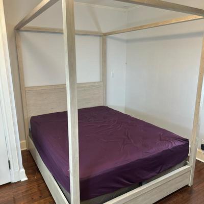 Canopy Style Bed Frame - Queen Size | Queen-size canopy style bed featuring a handcrafted wood finish, solid platform panels, and a...