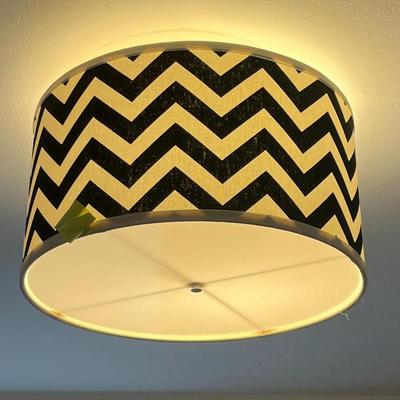 Black & White Chevron Light Fixture | Ceiling mount light fixture with a black and white chevron-patterned lampshade. - h. 0 x w. 16 in
