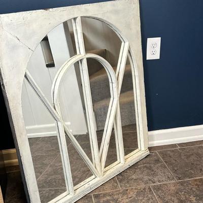 Distressed White Wall Mirror | Vintage arched window frame with mirrored panels and a white distressed finish. - h. 37 x w. 33 in
