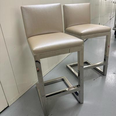 (2pc) Chrome & Faux Leather Counter Stools | Set of modern low-back counter chairs featuring sleek chrome frames and cushioned faux...