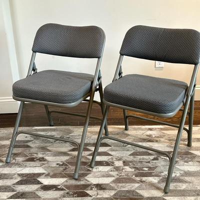 (2pc) Padded Folding Chairs | Padded folding chairs with foam seat cushions and backrests upholstered in gray patterned fabric, with...