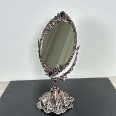 Vintage Style Vanity Mirror | Vintage style oval tabletop swivel vanity mirror with ornate details. - h. 11 x w. 5 in
