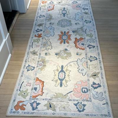Runner Rug - Abstract Floral Design | Runner rug features a cream-colored base with a symmetrical array of abstract floral and geometric...