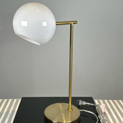 USB Table Lamp with Milk Glass Shade (1/2) | West Elm USB Table Lamp with an antique brass metal base, milk glass globe shade, and a...