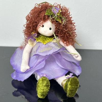Musical Doll - "Flower Fairy" (Purple) | Vintage (2000-2009) Green Tree Collectibles soft-bodied cloth musical doll. Without an...